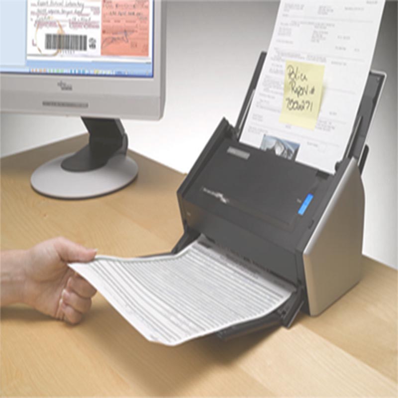Image Of Ether Document Solutions User Scanning Using Kofax Capture Scanner and Kofax Software